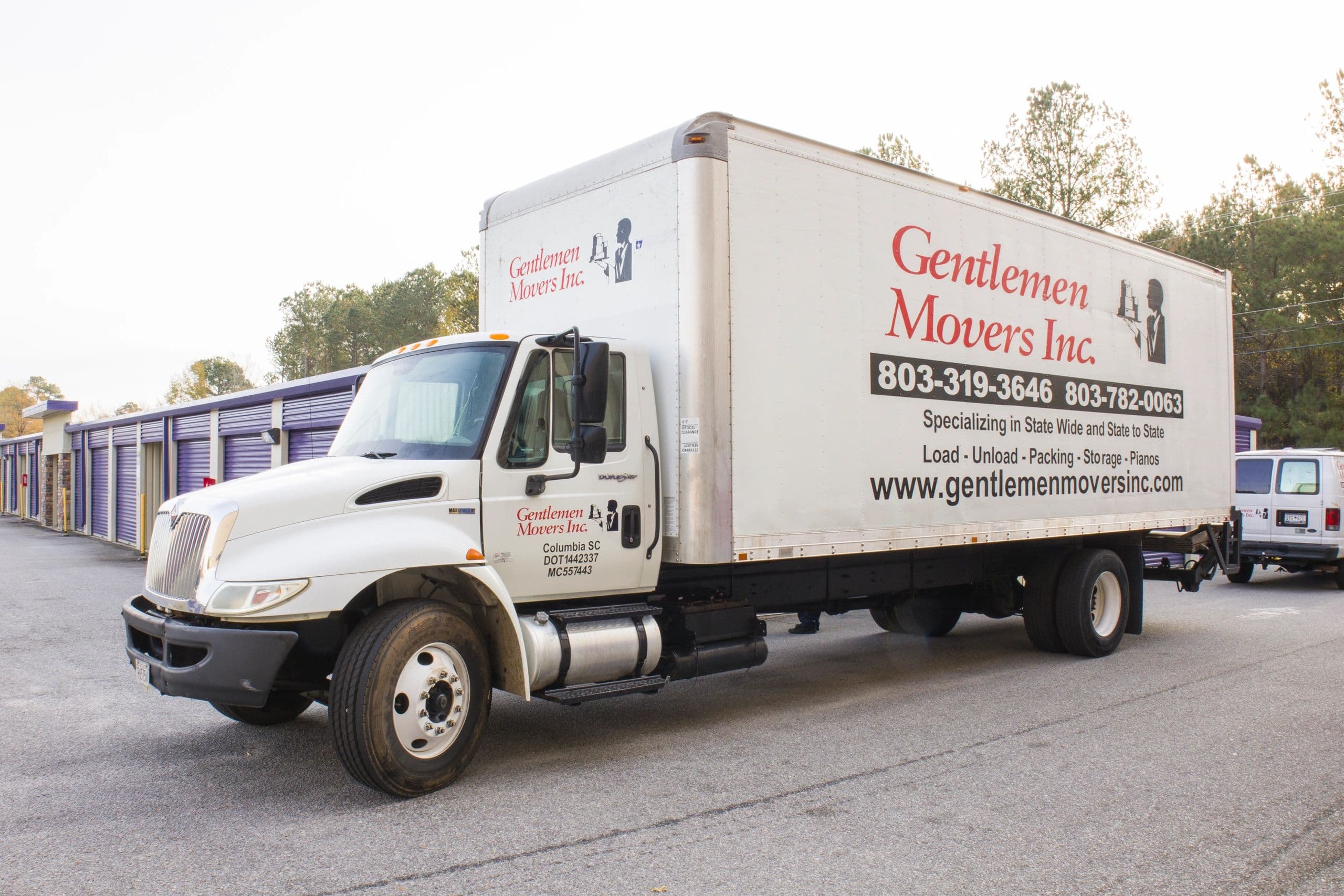 Gentlemen Movers crew with truck